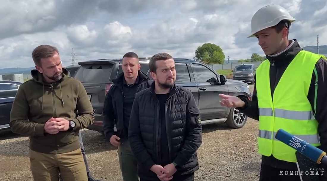 Kirill Timoshenko And His Team Give An Interview In Front Of The Assigned 50 Chevrolet Tahoe Car.